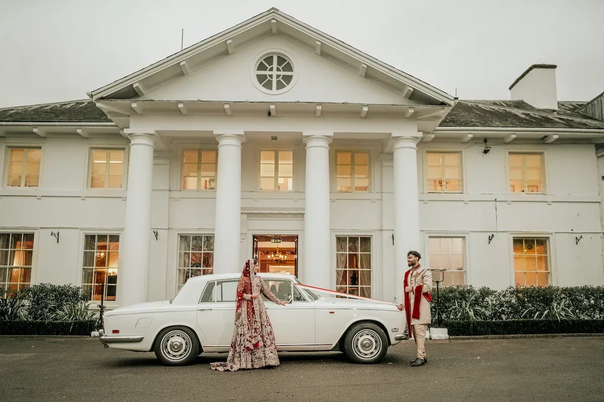 Documentary wedding photographer london bride groom vintage rolls royce.